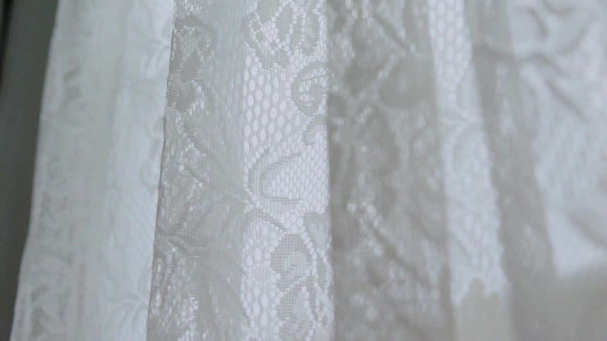 White curtain blowing in the wind