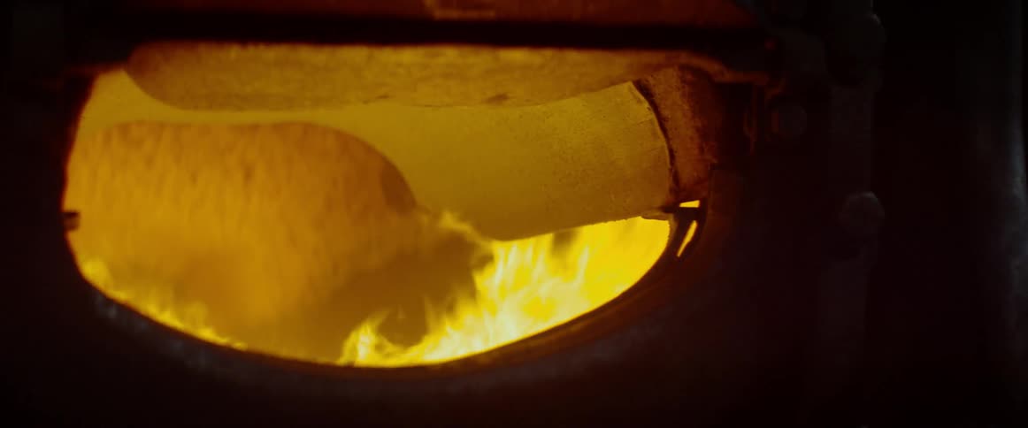 The fire in the pit is flickering at night