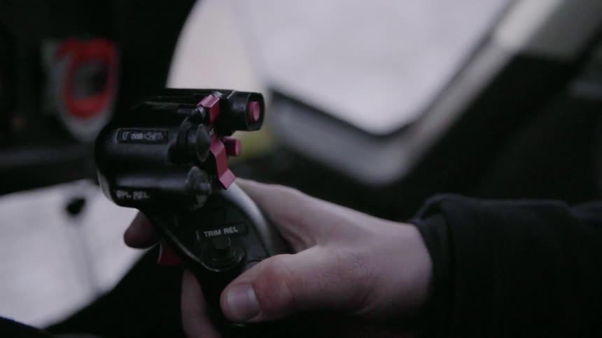 A person moves a controller