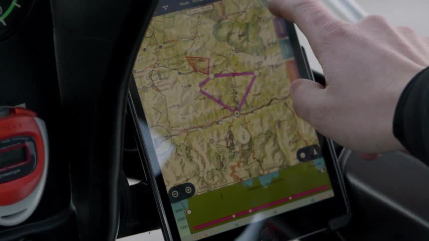 Person pulls up a map on a tablet
