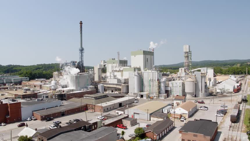 Smoke billowing out of factories