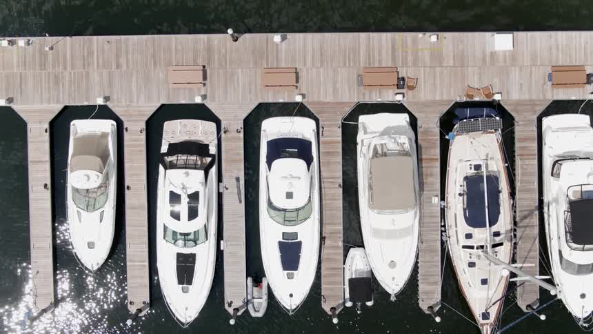 Boats are docked in a harbor