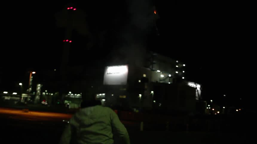 Man skates on a firework and tosses it into the air