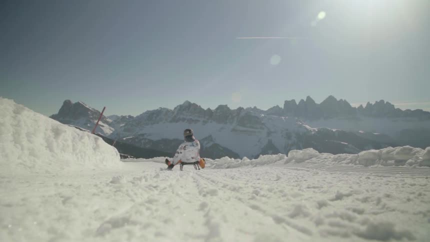 A sled is gliding over the snow