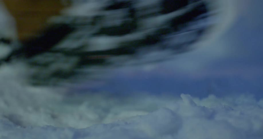 Man walks through snow in boots