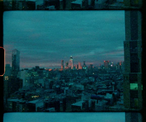 Clouds hang above the city skyline