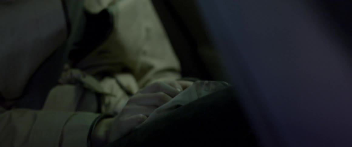 A person is riding in a vehicle