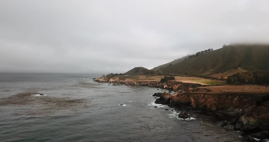 Waves flow onto the rocky shore