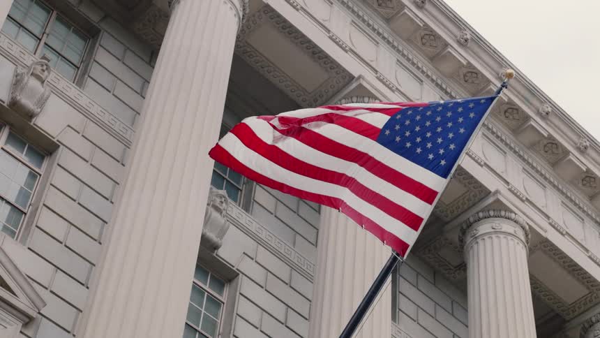An american flag waves in the breeze