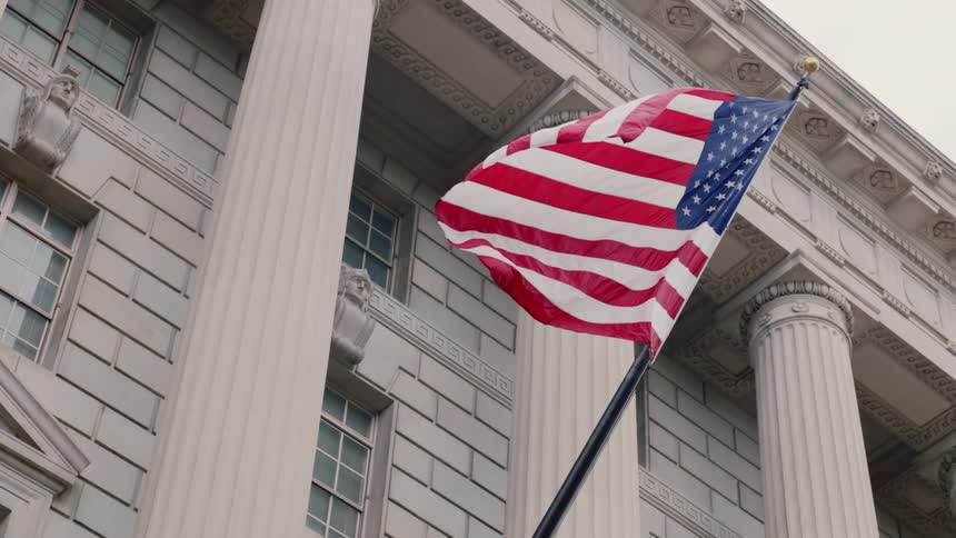 An american flag waves in the breeze