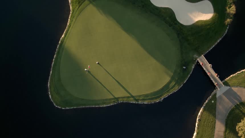 Golfers are playing on a golf course