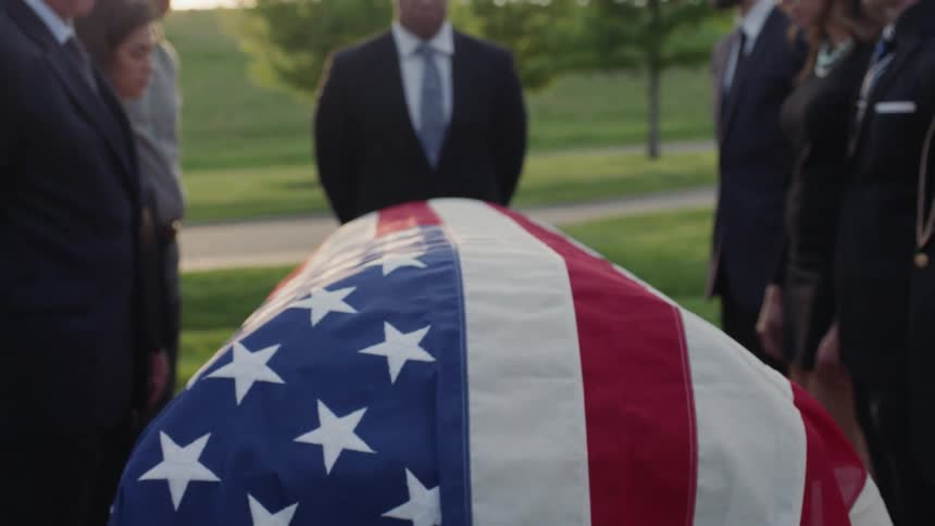 Close up of a flag covered casket