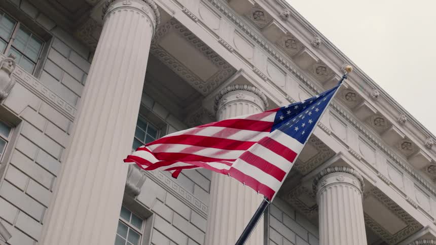 The american flag flows in the breeze