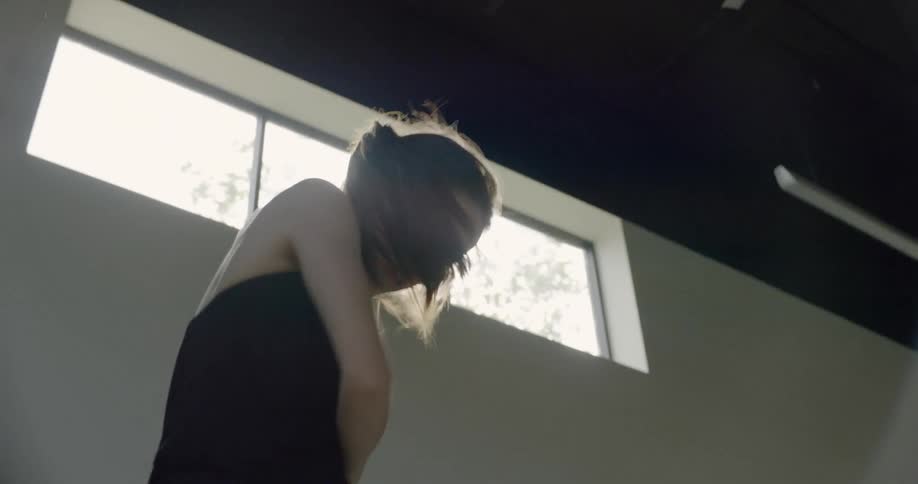 A dancer practices in a dance studio