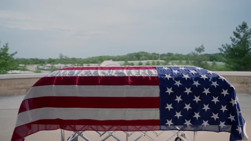 A flag covered casket