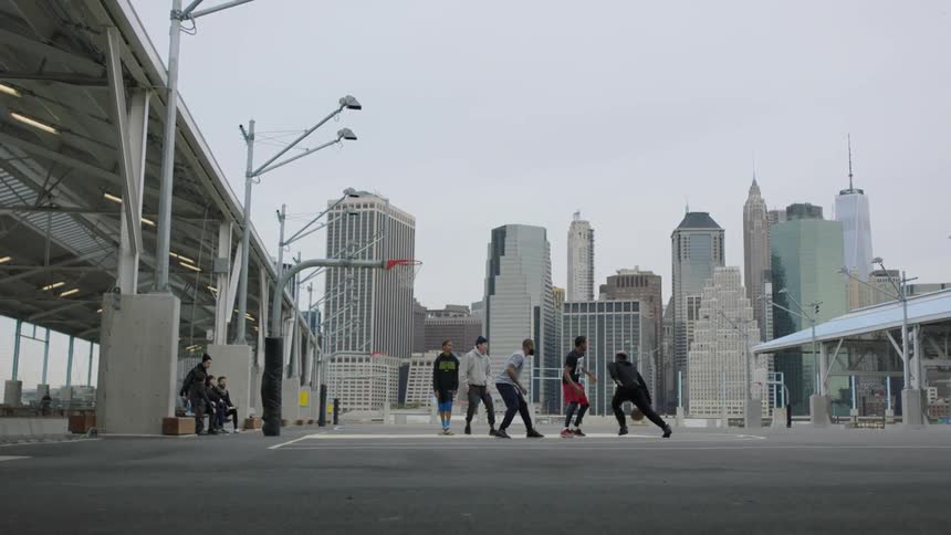 People playing outdoor basketball