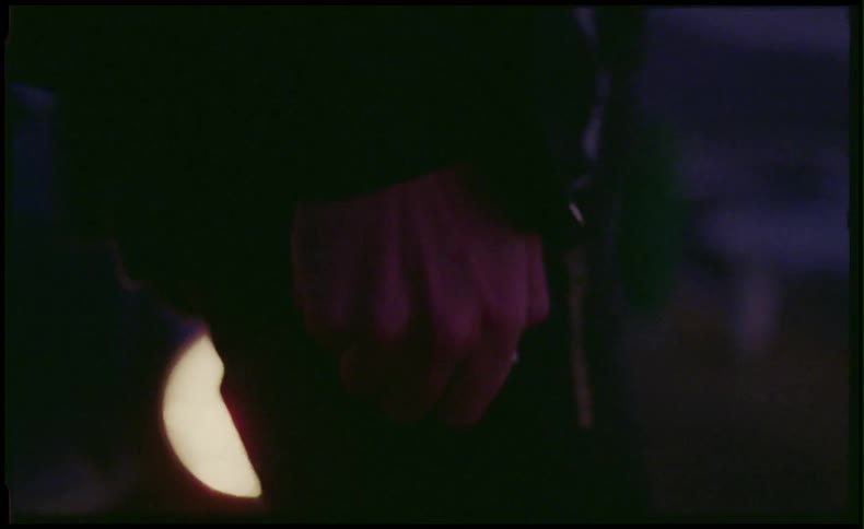 Man pacing around lighting a lighter