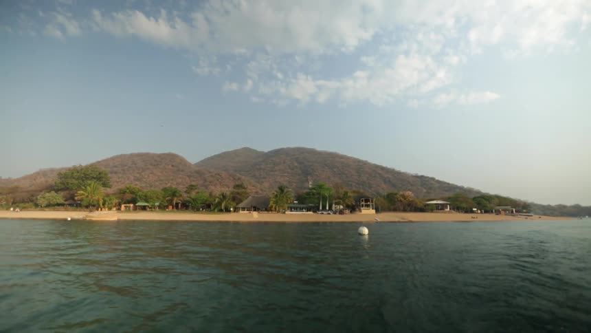 View of a lakeshore growing farther and farther away