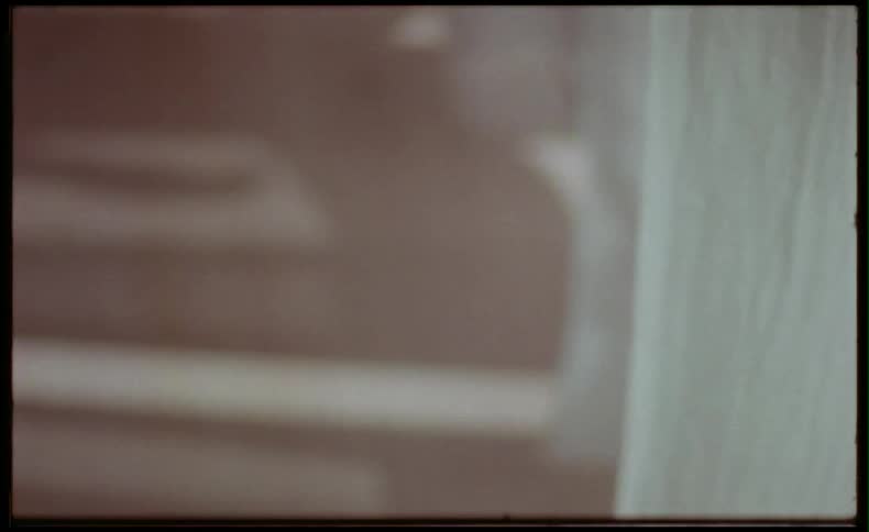 Curtains in a room blowing in the wind