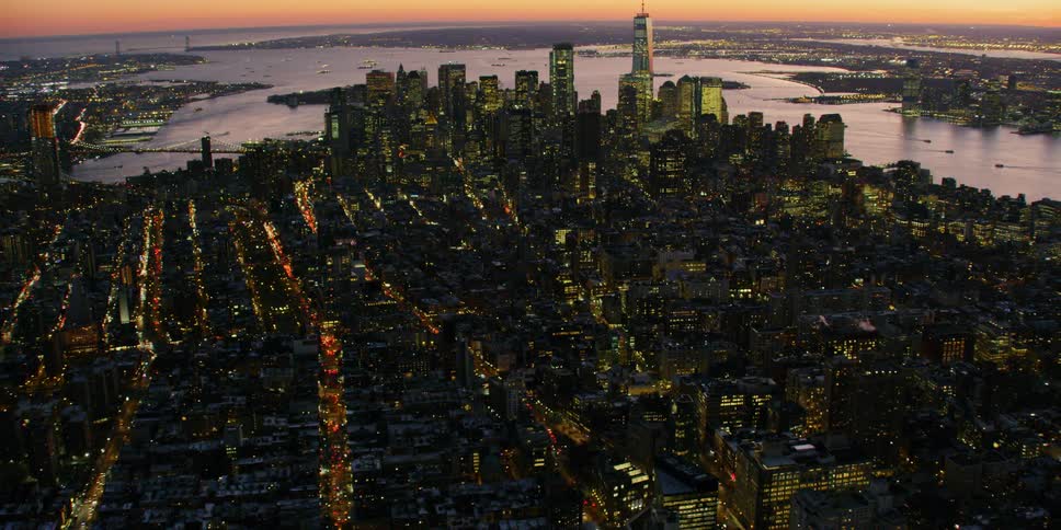 Tall city buildings tower into the sky