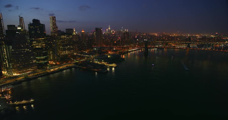 The city waterfront is filmed at night