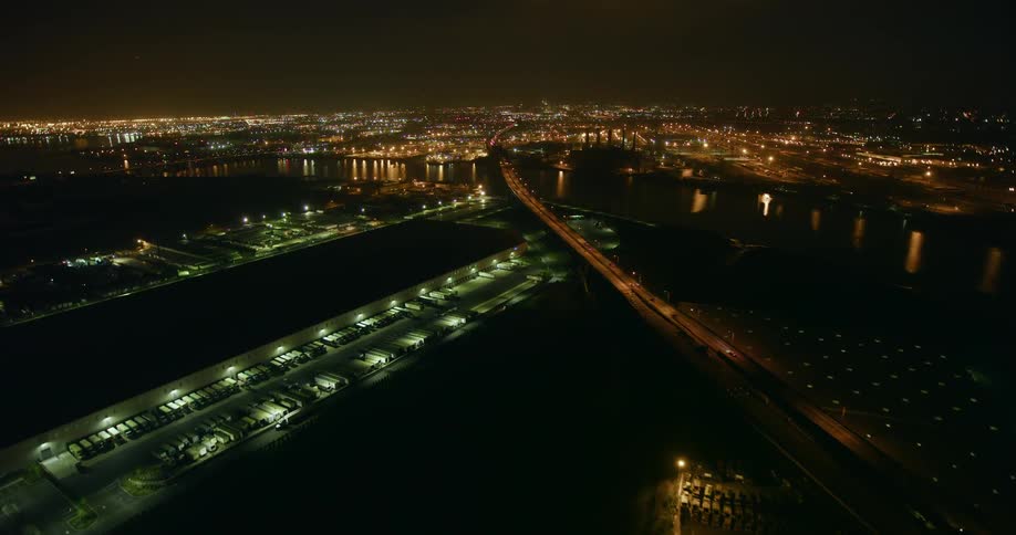 Bridge crosses a river leading into the city