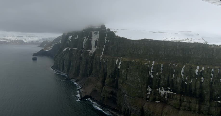 A mountain near a body of water