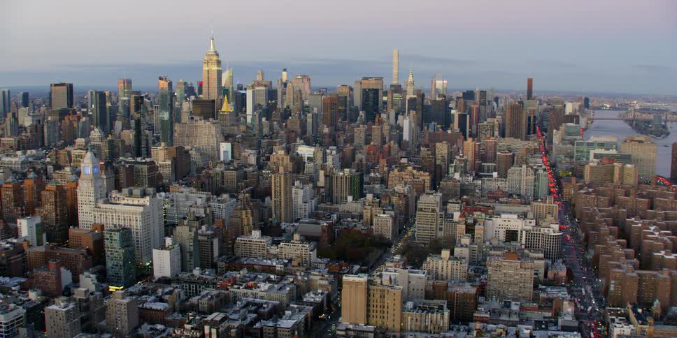 Tall city buildings tower into the skyline