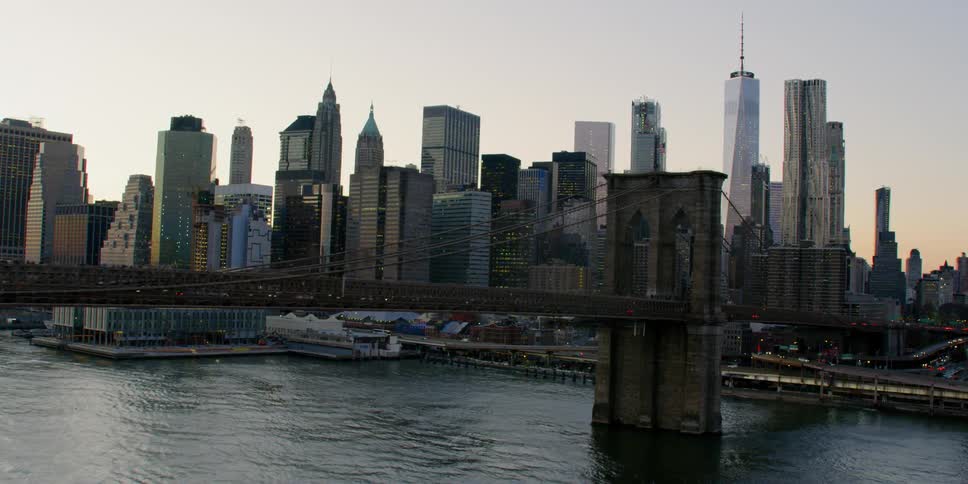 Bridge crosses a river leading into the city