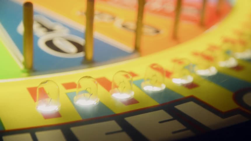 A carnival game with flashing lights
