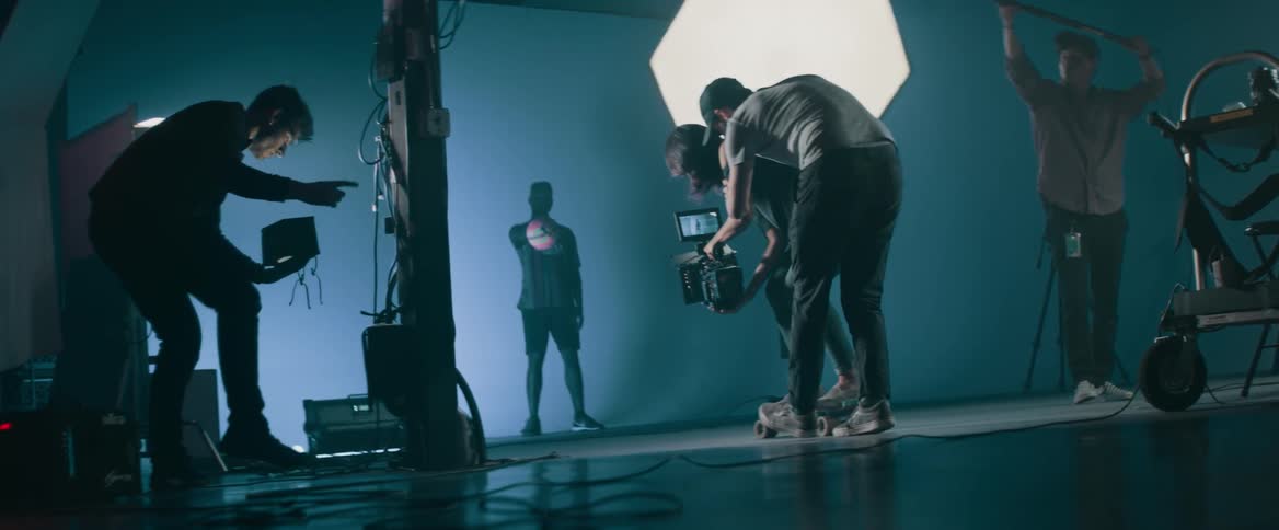 A group of people with cameras filming a commercial