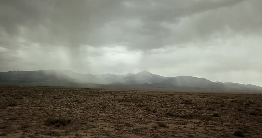 A Nevada desert mountain range in a rain storm
