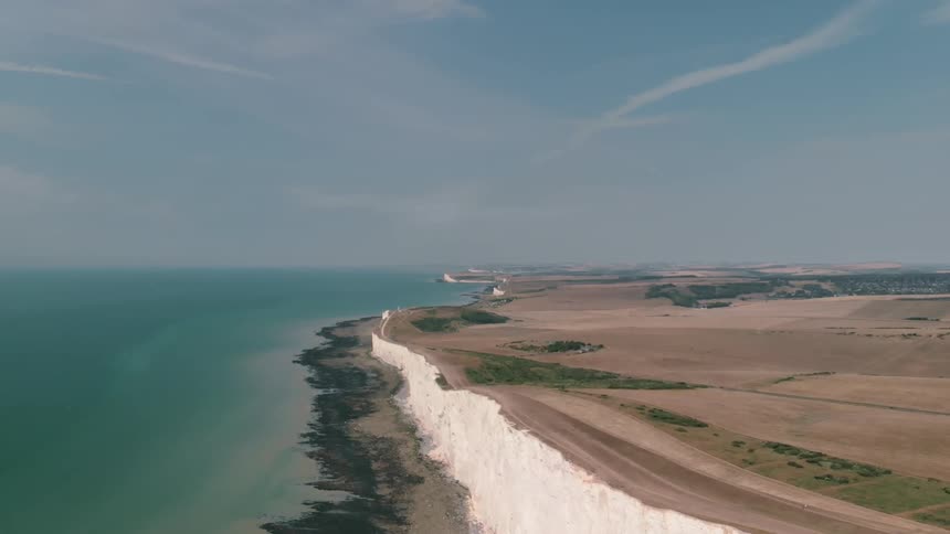 White rock cliffs line the ocean shore
