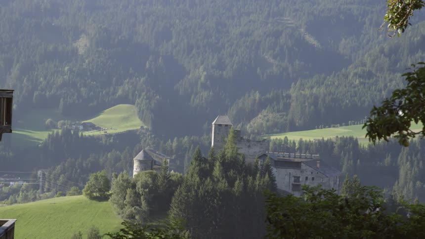Aerial view of a castle like structure in the countryside