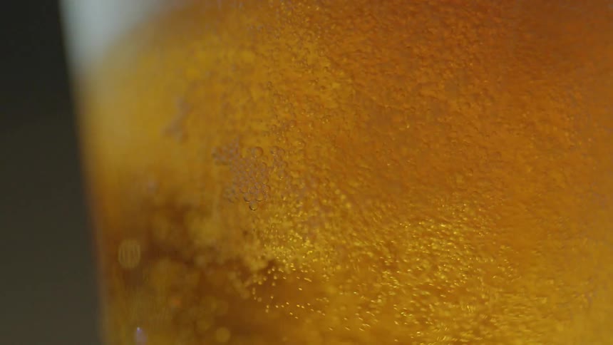 Beer fills a glass