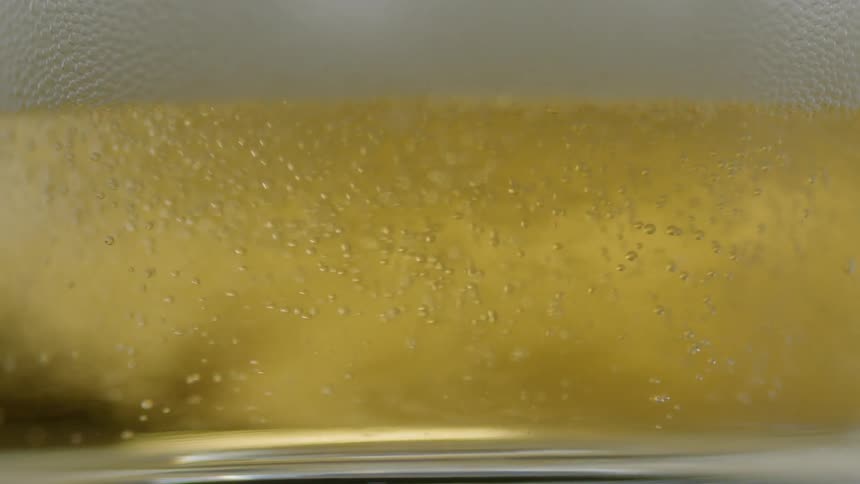 Beer bubbles and foams in a glass