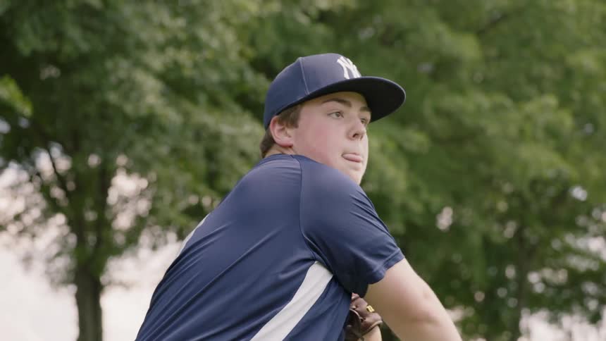 A pitcher throws a baseball