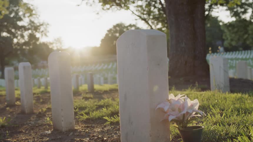The sun shines on  gravestones