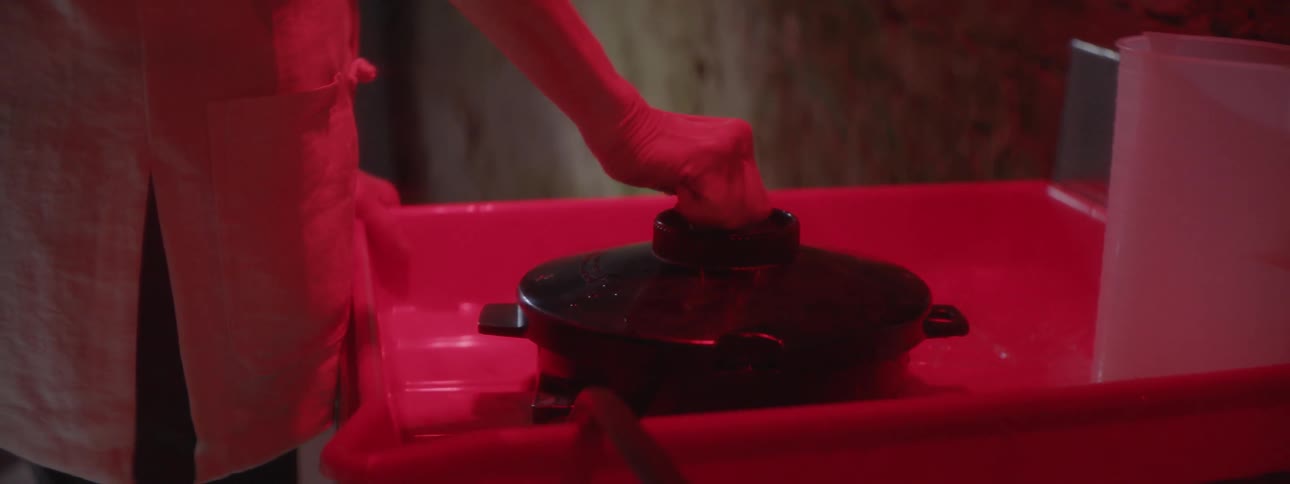 Woman turns a black knob