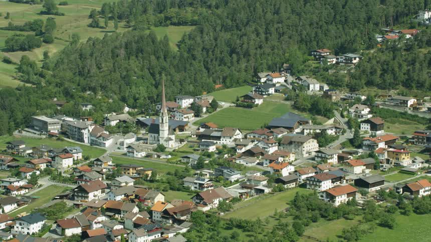 A rural city surrounded by trees