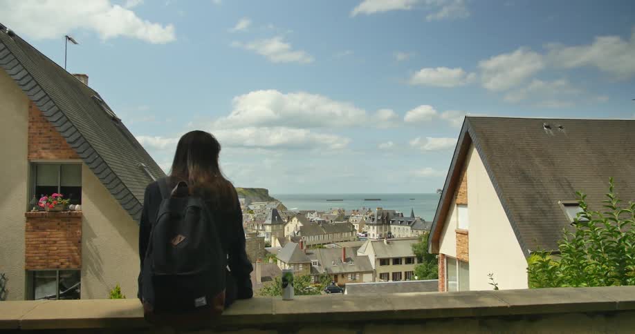 A woman looking over a quiet city