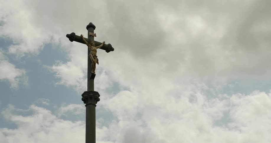 A cross on top of a steeple