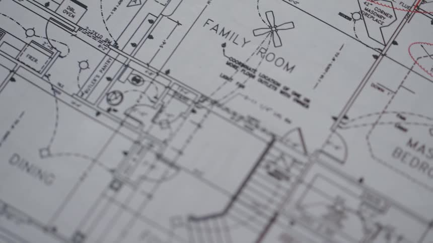 The blueprints have detailed sketches of each room