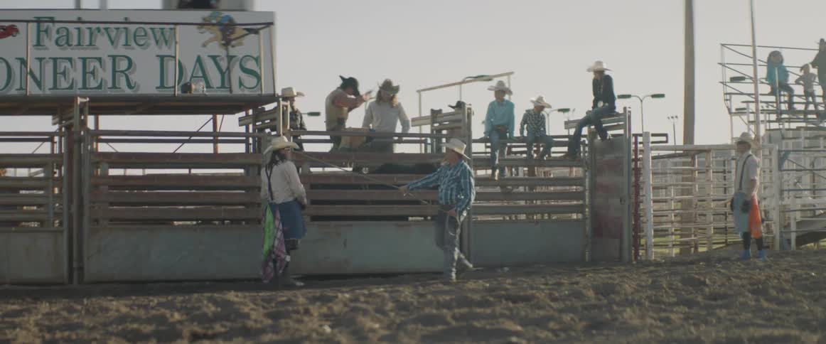 A man prepares to ride a bull