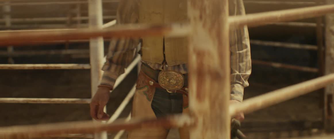 A bull rider amps himself up while waiting
