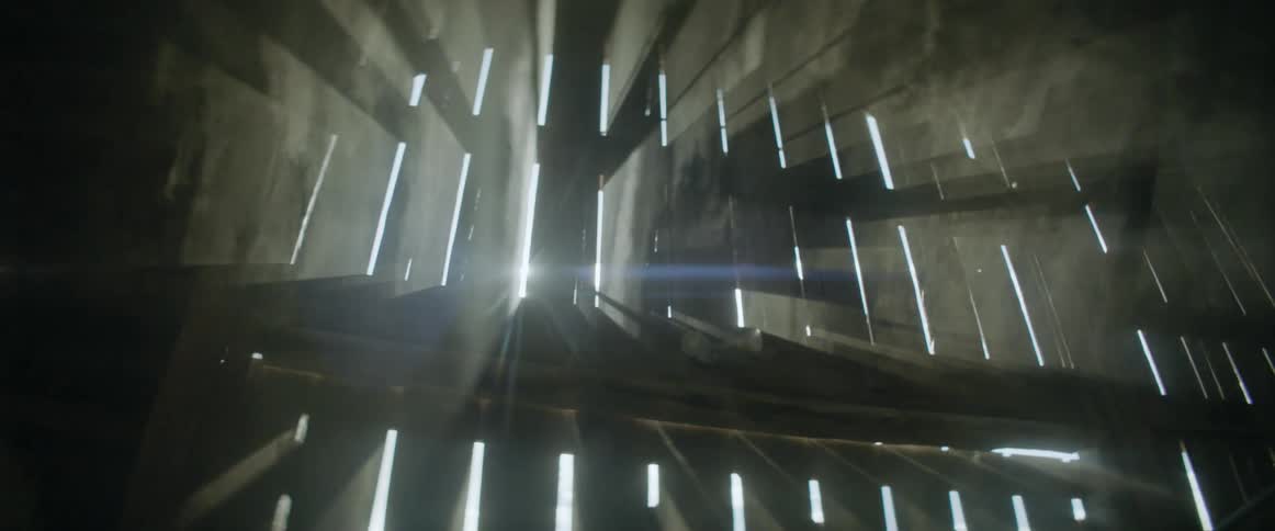 Dust and haze filters through barn doors