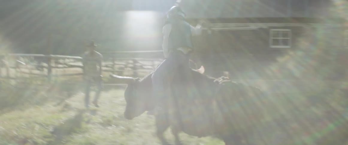 Man rides and is thrown from a bull