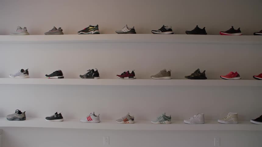 Shoes sit on a store shelf