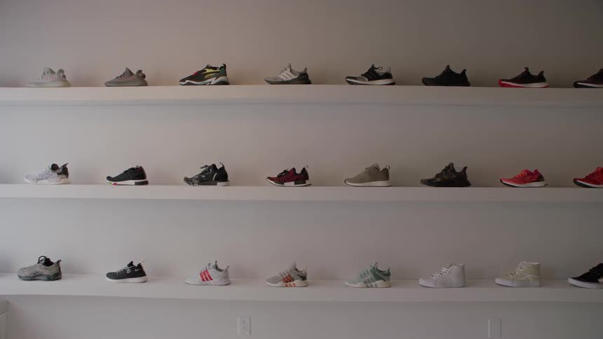 Shoes sit on a store shelf