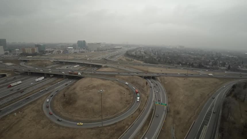 Traffic moving on a city's highway on and off ramps